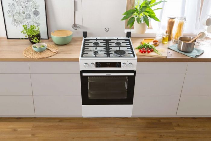 Плита Gorenje комбінована, 71л, 60x60см, приготування з паром, програматор, дисплей, чавун, з кришкою, білий