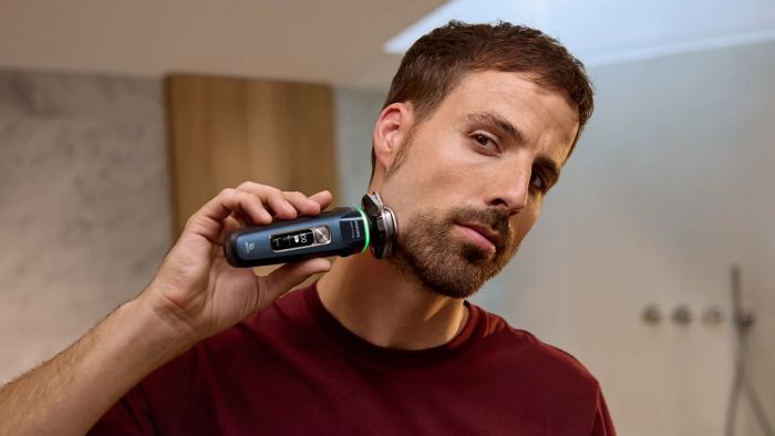 Бритва електр. Philips Series i9000 Prestige SkinIQ,  бритв.головок-3, Li-Ion, сух.+волог., індикатор заряду, твердий чохол, синій