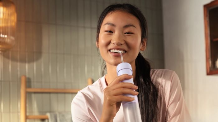 Іригатор Philips портативний Sonicare Compact Flosser 1000, чаша 200 мл, складний, фіолетовий Іригатор Philips портативний Sonicare Compact Flosser 1000, чаша 200 мл, складний, фіолетовий