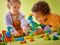 Конструктор LEGO DUPLO Town Динозаври на колесах 3в1