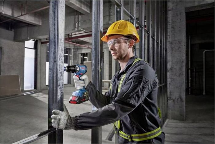 Набір із трьох акумуляторних інструментів Bosch Professional 18В дриль-шурупокрут GSR 18V-65, перфоратор GBH 18V-22, Шліфмашина кутова GWS 18V-8, акб 2x5А·год, ЗП 3 кейси L-BOXX 136