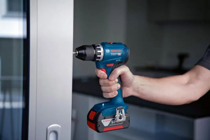 Набір із двох акумуляторних інструментів Bosch Professional 18В дриль-шурупокрут GSR 18V-45, Шліфмашина кутова GWS 18V-8, акб 2x4А·год, ЗП, сумка M-BAG