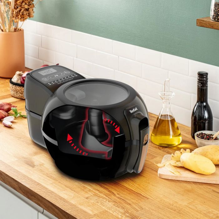 Мультипіч Tefal ActiFry & Grill Genius, 1500Вт, чаша-4л, сенсорне керув., підкл. до смартфону, авто перемішування, пластик, чорно-золотий